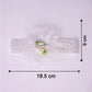 Close-up of colorful floral baby headband made from elastic fabric