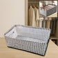 A foldable canvas storage basket, 42x28cm, shown open and ready for use in a clean home setting.