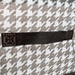 Detail shot of the canvas storage basket showing its reinforced steel support structure for durability.