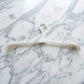 Foldable plastic hanger, ideal for space-efficient wardrobe storage