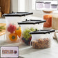 Set of three colorful reusable silicone food bags with zip seals.
