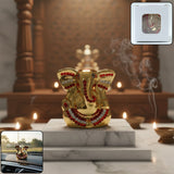 Golden Lord Ganesha idol with decorative stones for spiritual décor