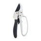 Gardening pruning shears actively cutting a small tree branch with precision.