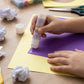 Smooth application of solid glue stick on paper for crafts