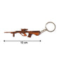 Decorative gun-shaped metal keychain in vintage style