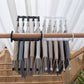 Organivo space-saving hanger with adjustable arms, demonstrating ease of use for trousers.