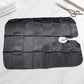 Professional hair cutting apron cape hanging on hook