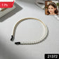 Slim gold tone pearl headband styled for women