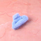 Heart shaped design soft faux fur hair claw clip adding fashion flair.