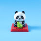 Solar energy powered panda decor with nodding head feature