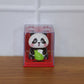 Small animated solar powered panda ornament with movement