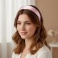 Padded satin hairband from different angles highlighting its satin finish