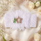 Baby headband with floral bow in pastel colors, gentle on sensitive skin