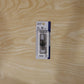 Close-up of stylish metal key holder with lock clip