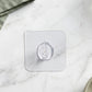 Hook attached on glass surface for versatile hanging