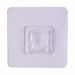 Transparent wall hook attached to a smooth surface for organization.