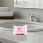Close-up image showing shampoo sachet and bath soap in the toiletry kit