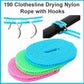 Portable nylon clothesline drying clothes in an outdoor camping setting.