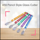 Hand holding the pencil-style glass cutter, ready for use.