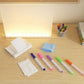 LED writing board placed on desk showing clear messages