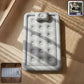 Portable inflatable bed folded for storage with easy carrying handle