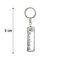 Close-up of Jay Sonal Ma devotional keychain in metallic finish