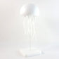 Colourful LED jellyfish lamp creating ambient lighting for home