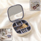 Plastic jewelry storage box with mirror, perfect for travel