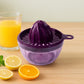 Manual citrus juicer with 650ml capacity made of durable plastic