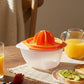 Pomegranate seed remover juicer with juice collected inside the container