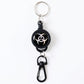 Durable retractable keychain securely clipped onto a fabric strap.
