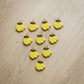 Group of yellow banana-shaped keychains