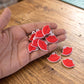 Set of fashionable lips bag charms and keyrings displayed together
