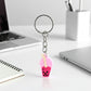 Bubble tea keychain displayed on a backpack zipper pull
