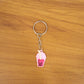 Lifestyle image showing bubble tea keychain as a trendy bag charm