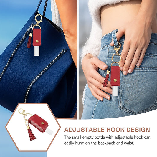 Open faux leather sanitizer holder keychain showing clear refillable bottle