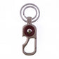 Modern design metal key holder that clips easily onto belts and bags.