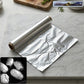 Heavy-duty aluminium foil roll for kitchen use in stainless steel dispenser