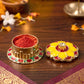 Kumkum box enhancing pooja thali decor in traditional style