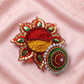 Decorative kumkum dani suitable for festival rituals.