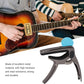 Side profile of the Wagtail guitar capo, highlighting its durable plastic construction.