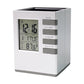 LCD display of digital desk clock showing time, date, and temperature clearly