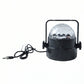 Hand holding the small USB powered star projector light, highlighting its compact size.