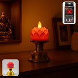 Lotus shaped LED flameless candle emitting warm glowing light on decorative holder