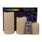 Three decorative LED flameless candles with remote control on display