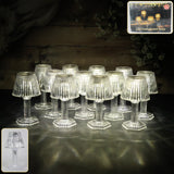 Crystal style LED table lamp with warm yellow glow on a table