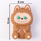 Lightweight mini silicone keychain pouch with strap for hanging on bags