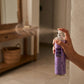 Close-up of lavender air freshener spray bottle for rooms and cars