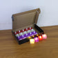 Set of 24 multi-color LED tealight candles emitting warm flickering light