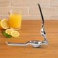 Closeup of steel lemon squeezer highlighting sturdy build and bottle opener